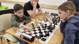 1.kolo: R.Šuplata - E.Bartošová 0:1